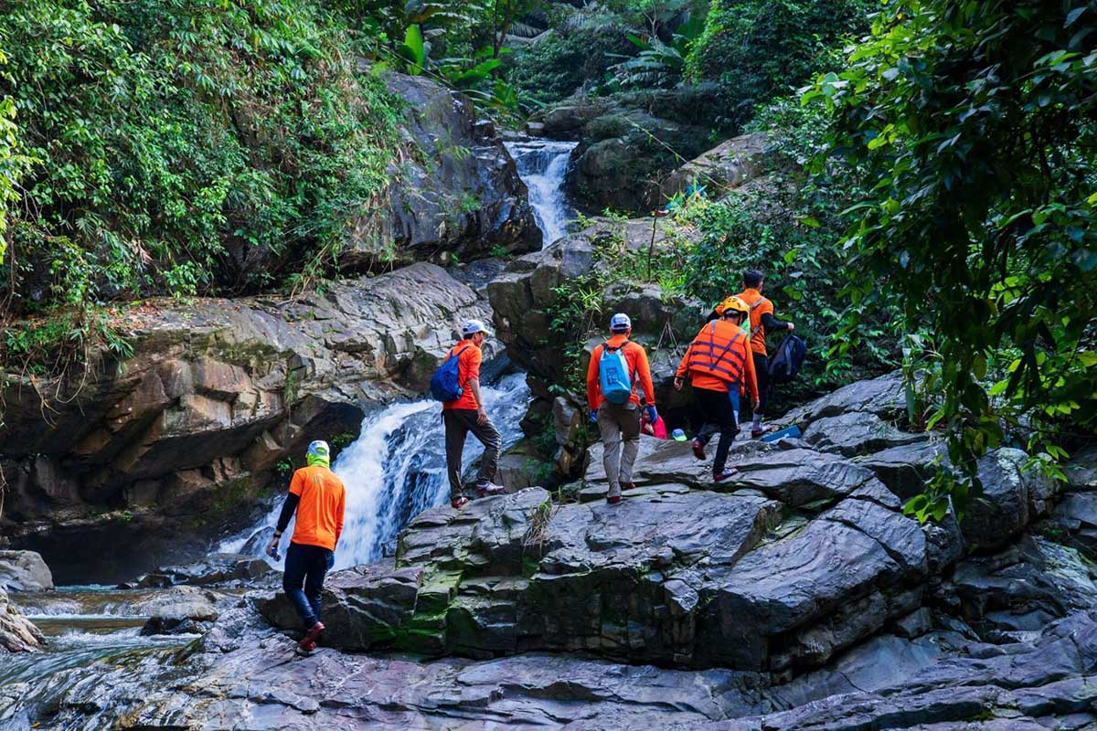 things to do in quang binh - duong cam waterfall - trekking in quang binh vietnam 